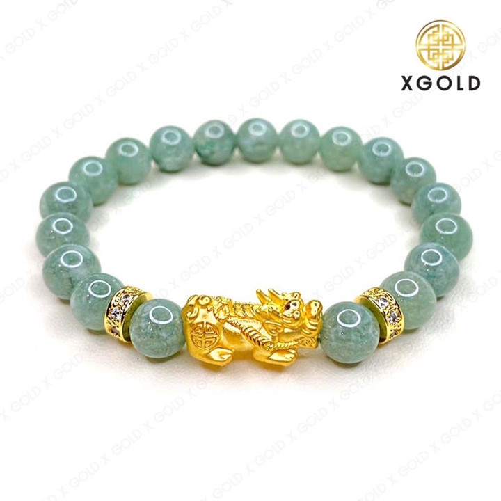 纯金貔貅（神话生物），重0.7-1克，饰有一对水下宝石吊坠。