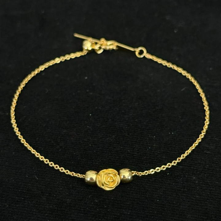 Bracelet de luxe en or avec breloques | Authentique et garanti