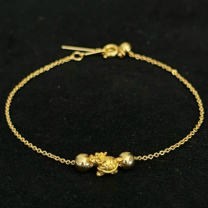 Bracelet de luxe en or avec breloques | Authentique et garanti