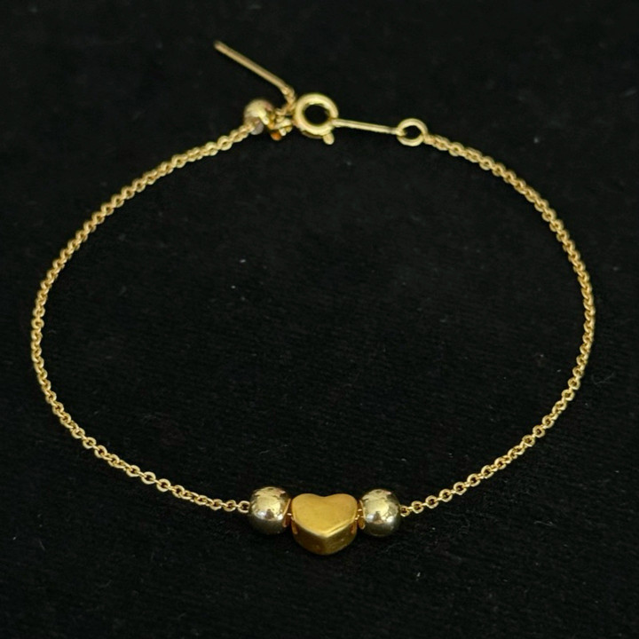 Bracelet de luxe en or avec breloques | Authentique et garanti