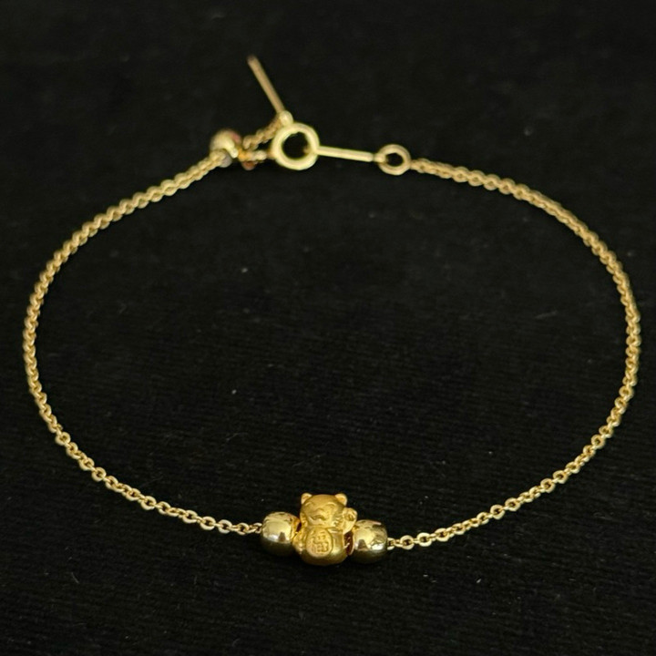 Bracelet de luxe en or avec breloques | Authentique et garanti