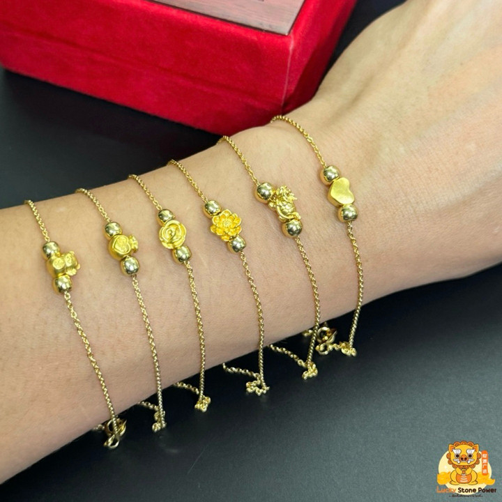 Bracelet de luxe en or avec breloques | Authentique et garanti