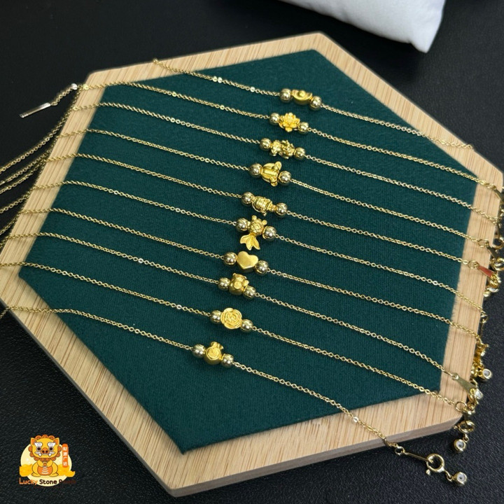 Bracelet de luxe en or avec breloques | Authentique et garanti