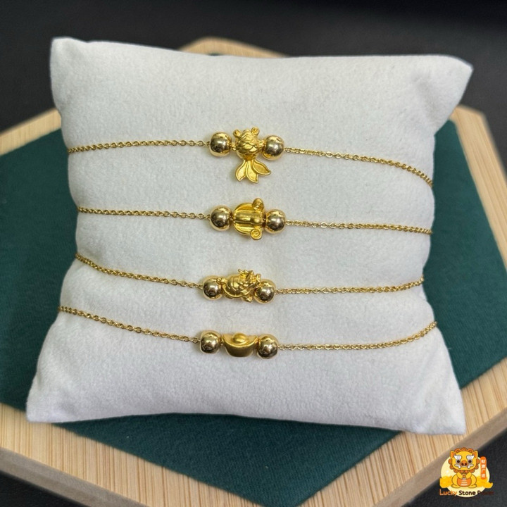 Bracelet de luxe en or avec breloques | Authentique et garanti