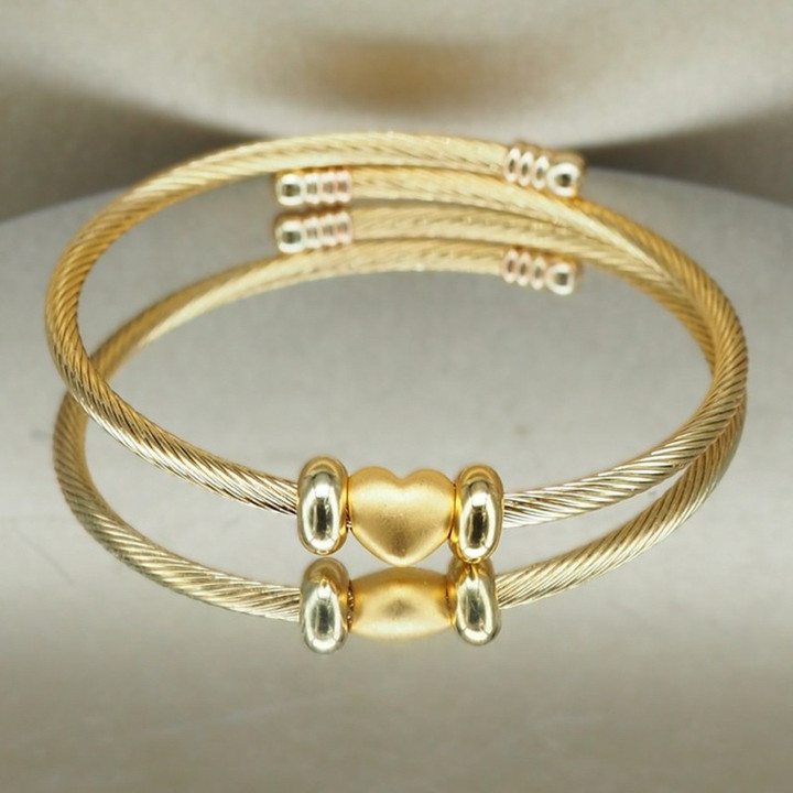 Anya 金心形吊坠（纯 24K 金，0.35 克）