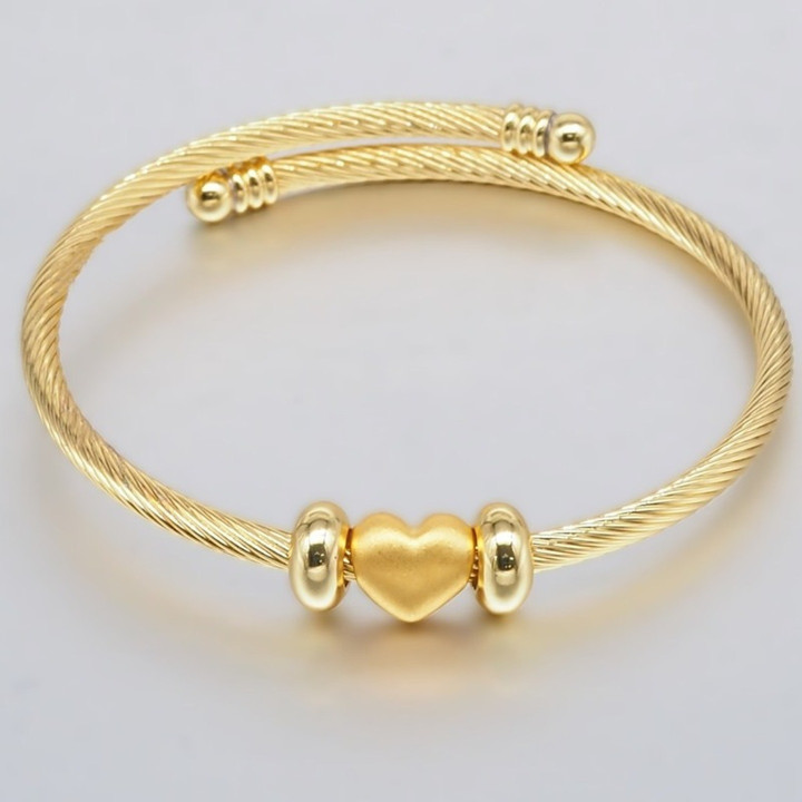 Anya 金心形吊坠（纯 24K 金，0.35 克）